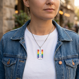 Person wearing rainbow necklace