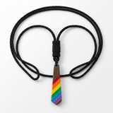 AI-generated product photo of the rainbow tie pendant necklace on a white background.